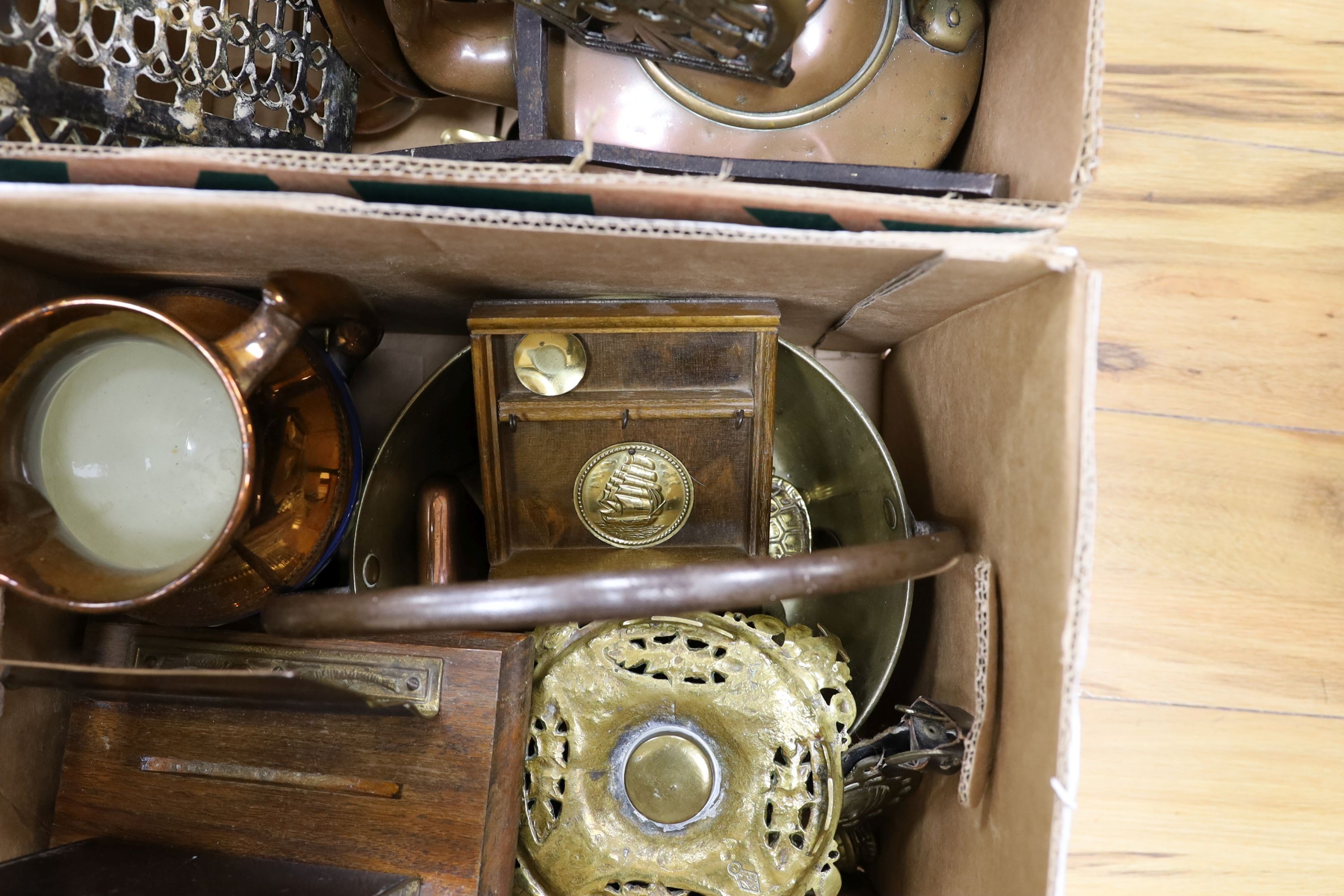 Two boxes of brass and copper ware, and a copper lustre jug